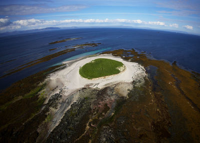 Aerial view of green island in the breiðafjörður bay in west iceland