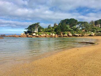 Scenic view of beach against sky