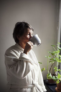 Senior woman drinking coffee