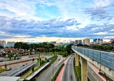 High angle view of highway in city against sky