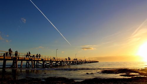 Scenic view of sea against sky at sunset