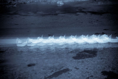 Close-up of illuminated water at night