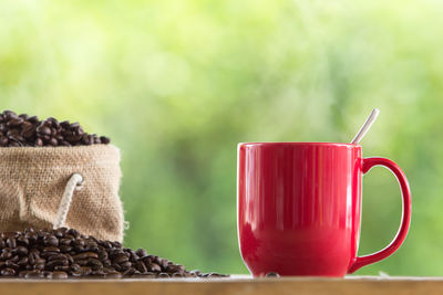 Close-up of coffee cup on table