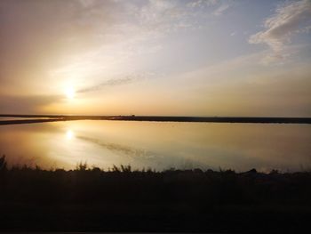 Scenic view of silhouette landscape against sky during sunset