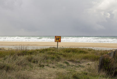 Scenic view of beach against sky