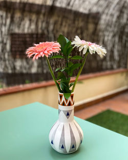 Close-up of flower vase on table