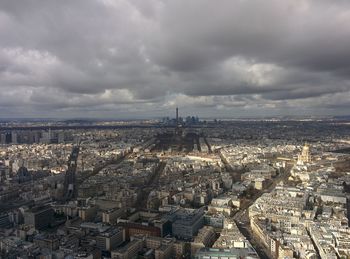 High angle view of city against cloudy sky