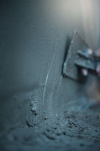 Close-up of old car on snow