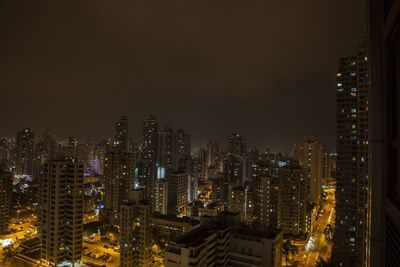 Illuminated cityscape at night