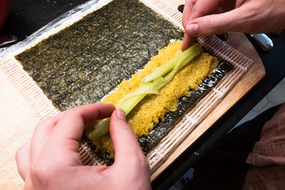 High angle view of person preparing food