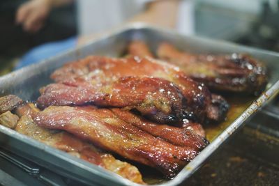 Close-up of meat on barbecue grill