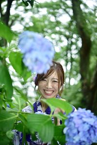 Portrait of a smiling young woman outdoors