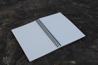 High angle view of open book on table