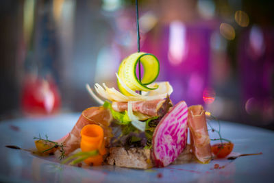 Close-up of fruits served on table