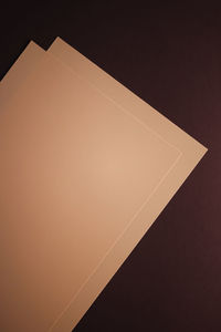 High angle view of paper against white background