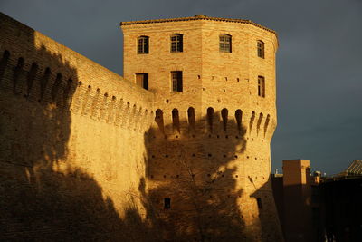 Low angle view of fort against sky