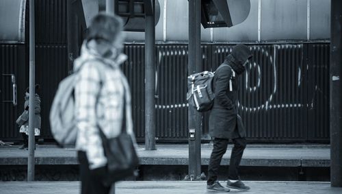 People at railroad station platform