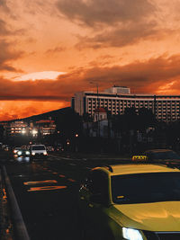 High angle view of city street against sky during sunset