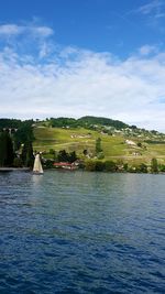 Scenic view of sea against cloudy sky