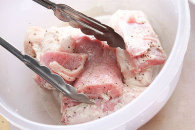 High angle view of meat in plate on table