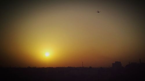 Scenic view of silhouette landscape against sky during sunset