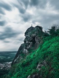 Low angle view of rock formations against sky