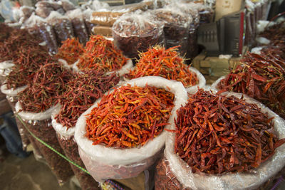 Close-up of chili peppers for sale in market