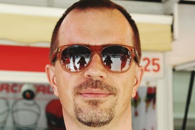 Close-up portrait of man wearing sunglasses