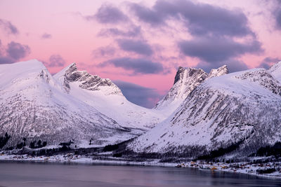 Scenic view of snowcapped mountains against sky during winter