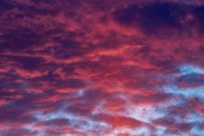 Low angle view of dramatic sky during sunset