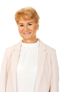 Portrait of a smiling young woman over white background
