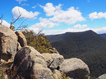 Rock formations on landscape against sky