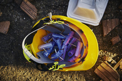 High angle view of garbage bin on land