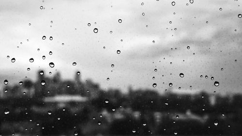 Close-up of water drops on glass