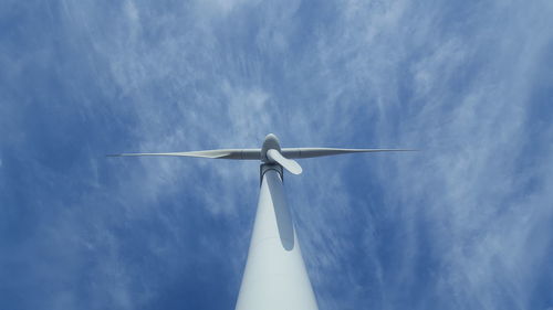 Low angle view of wind turbine against sky