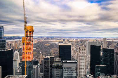 Modern buildings in city against sky