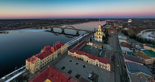 High angle view of river amidst buildings in city