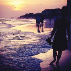 Scenic view of sea at sunset