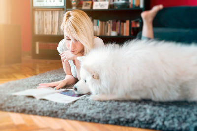 Woman with dog at home