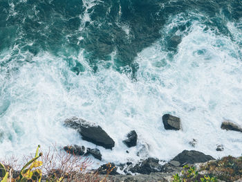 Waves splashing on rocks