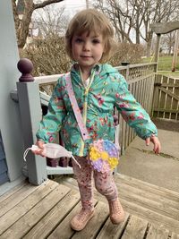 Toddler going shopping with purse 