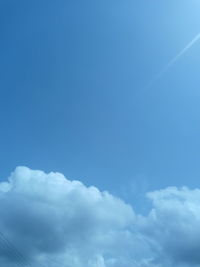 Low angle view of clouds in blue sky