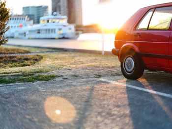 Close-up of car on road