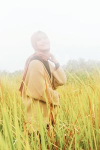 Full length of man on field against sky