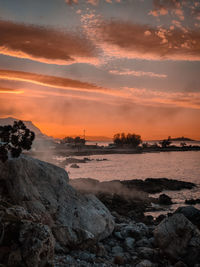 Scenic view of sea against sky during sunset