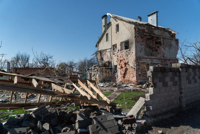 Low angle view of old ruins against sky