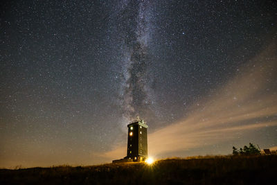 Scenic view of sea against sky at night