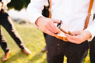 Close-up of man holding hands