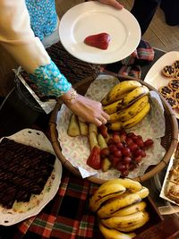 High angle view of fruits in plate on table