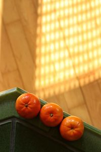 Close-up of tangerine on table